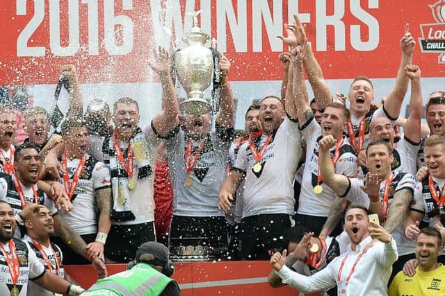 The Hull FC squad celebrate winning the Challenge Cup