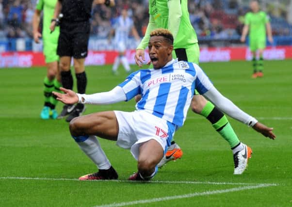 Rajiv Van La Parra celebrates scoring the only goal of the game for Huddersfield Town against Wolves (Picture: Gary Longbottom).