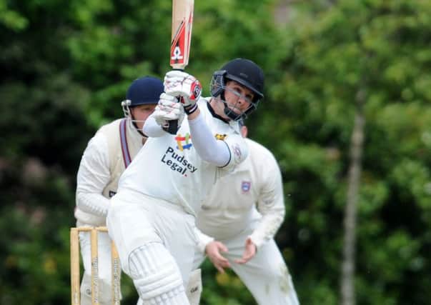IN FORM: Pudsey St Lawrence opener Adam Waite hit an unbeaten century in the rain-hit game against Cleckheaton. Picture: Steve Riding