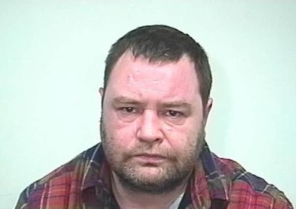 Craig Smith, 47, from Leeds, is wanted on recall to prison.