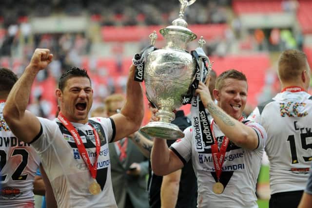 Hull's Steve Michaels, pictured right with Mark Minichiello, celebrate the win at Wembley. Picture : Jonathan Gawthorpe