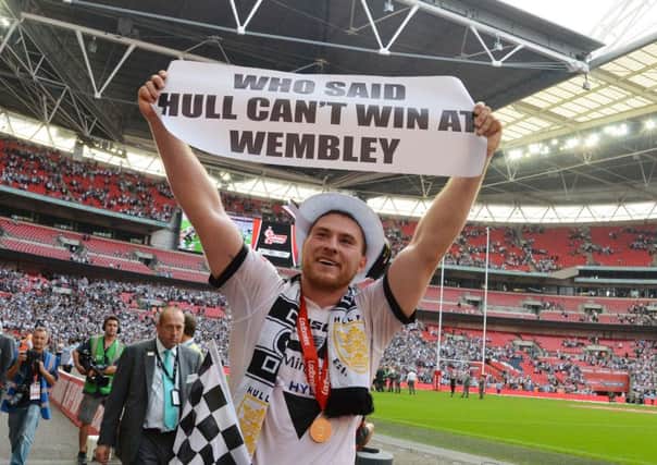 Hull FC's Scott Taylor celebrates victory during the Challenge Cup Final match at Wembley Stadium, London.