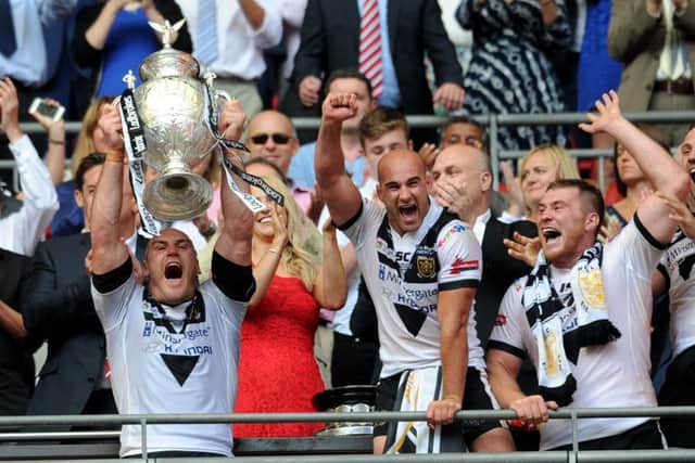 Hull's captain Gareth Ellis lifts the trophy.
 (Picture: Jonathan Gawthorpe)