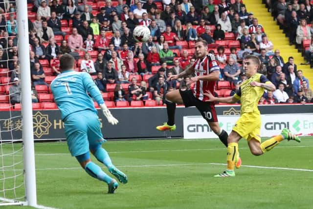 Billy Sharp of Sheffield United scoring his teams first goal of the game during the EFL League One match at the Bramall Lane Stadium, Sheffield. Picture date: August 27th, 2016. Pic Jamie Tyerman/Sportimage
--------------------
Sport Image
16/17 CONT Sheff Utd v Oxford
27 August 2016
©2016 Sport Image all rights reserved