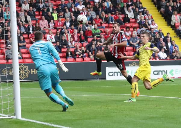 Billy Sharp of Sheffield United scoring his teams first goal of the game during the EFL League One match at the Bramall Lane Stadium, Sheffield. Picture date: August 27th, 2016. Pic Jamie Tyerman/Sportimage 
--------------------
Sport Image
16/17 CONT Sheff Utd v Oxford

27 August 2016
Â©2016 Sport Image all rights reserved