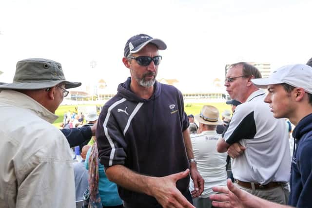 CHEERS COACH:  Jason Gillespie is congratulated by Yorkshire supporters after leading the club to the County Championship title in 2014.