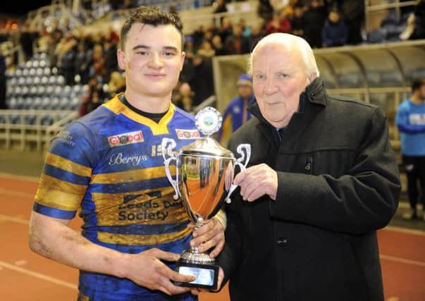 JANUARY 216: 
Jordan Lilley receives the Lazenby Cup from Harry Jepson OBE.