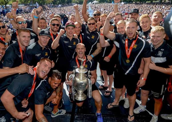 Hull FC players celebrating in front of a 20,000 supporters