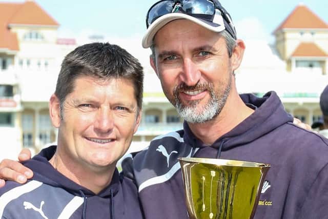 MAGIC MEMORY: Yorkshire director of cricket, Martyn Moxon, and first team coach Jason Gillespie celebrate with the County Championship trophy at Trent Bridge in 2014.