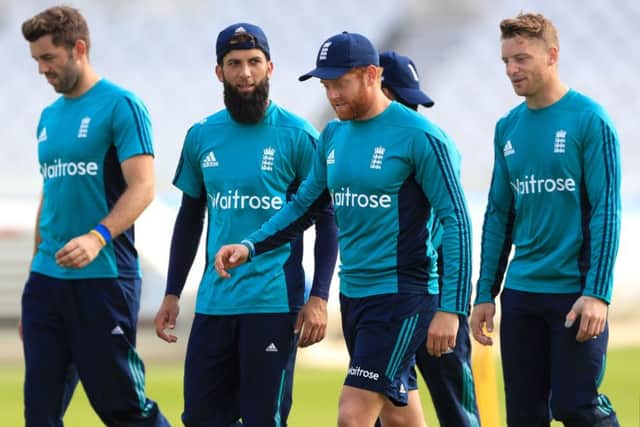 WARMING UP: England's Moeen Ali (centre left) alongside team-mates Jonny Bairstow, Liam Plunkett, left, and Jos Buttler, right, at Trent Bridge on Monday. Picture: Tim Goode/PA.