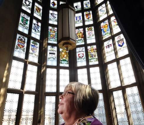 Janet Senior pictured by the stained glass windows in the Banqueting suite at City Hall, Bradford.
Picture by Simon Hulme