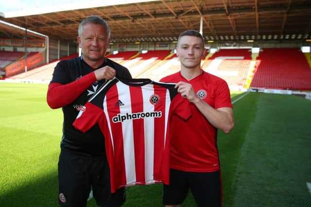 Chris Wilder welcomes new signing Caolan Lavery to Sheffield United.