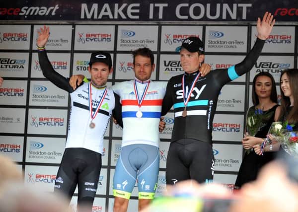National road race champion Adam Blythe (centre) with Mark Cavendish (left)