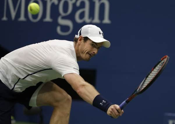 Andy Murray returns a shot on his way to defeating Marcel Granoller (Picture: Andres Kudacki/AP).
