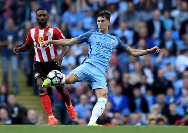 John Stones pictured playing for Manchester City against Stoke City.
