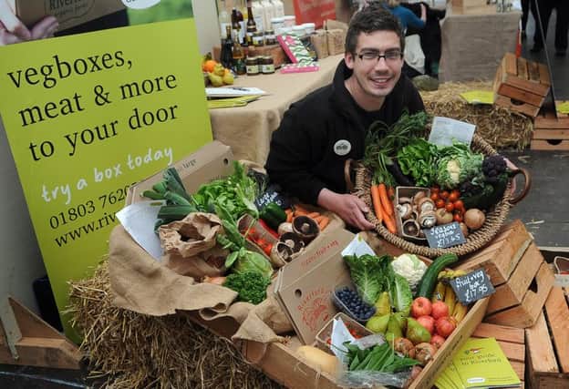 Matt Bretherwick, of Riverford Organic Farms, at the Malton Food Lovers Festival with his stall of fresh vegetables.