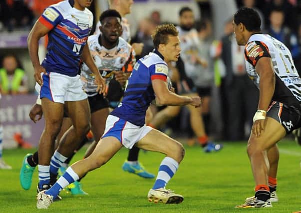 Wakefield's Jacob Miller attacks the Castleford defence.