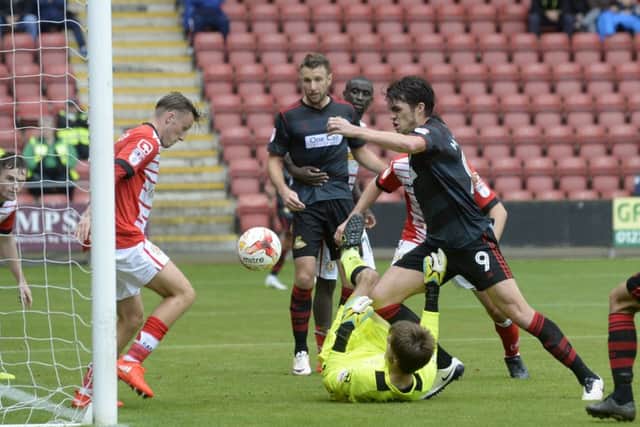 John Marquis can't get a shot in past the Crewe defence.  Picture Bruce Rollinson