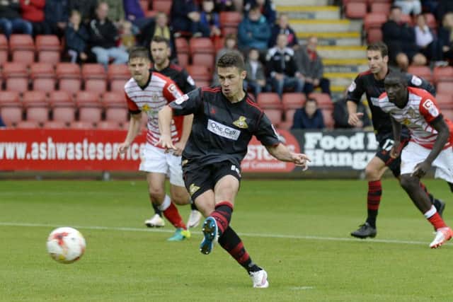 Doncaster Rovers' Tommy Rowe equalises from the penalty spot against 
Crewe Alexandra (Picture: Bruce Rollinson).