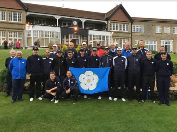 Yorkshire players and officials assemble in front of the clubhouse after retaining their Northern Counties League title (Pictures: Chris Stratford).