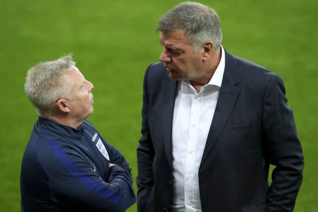 England Assistant Manager Sammy Lee (left) and England Manager Sam Allardyce on the pitch during a walkaround at the City Arena, Trnava.