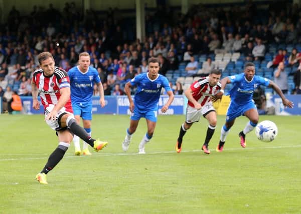 Sheffield United's Billy Sharp scores his side's late winner against Gillingham from the penalty sport (Picture: David Klein/Sportimage).