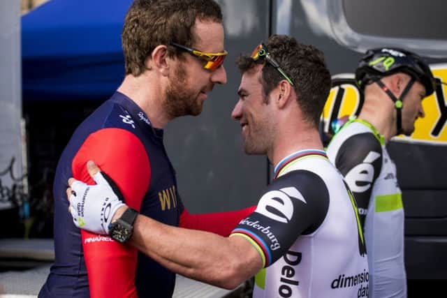 FANCY MEETING YOU HERE: Sir Bradley Wiggins and Mark Cavendish greet each other before stage one of the 2016 Tour of Britain. Picture: Craig Watson/PA.