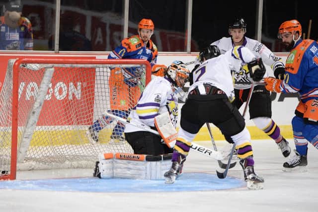 GOOD TO BE BACK: Mathieu Roy, far right, squeezes home the puck for his and the Steelers' second against Manchester. Picture: Dean Woolley.