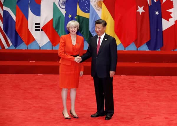 Theresa May with her Chinese counterpart at the G20 summit.