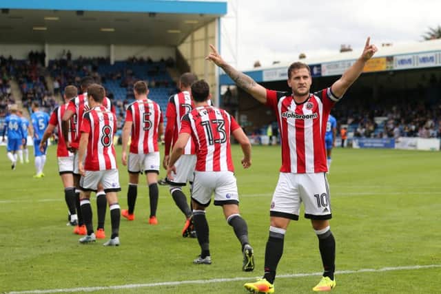 Sheffield Uniteds Billy Sharp celebrates scoring the late winner at the Priestfield Stadium, Gillingham. (Picture: Sport Image)