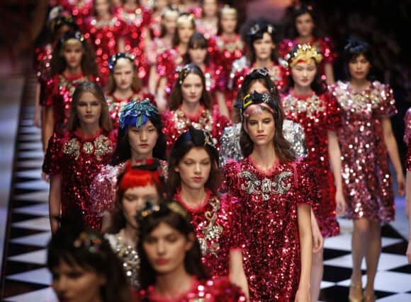 Dolce & Gabbana on the catwalk for autumn in Milan. AP Photo/Luca Bruno