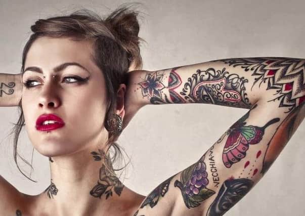 Tattoos can increase your job prospects, experts now say