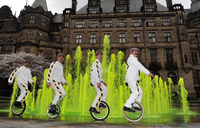 To launch the Yorkshire Festival in 2014, a unicycle disply team performed in front of fountains which had been turned yellow, in Sheffield's Peace Gardens.