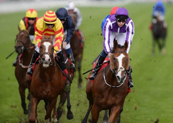 Leading Light and Joseph O'Brien (right) win the Ladbrokes St Leger Stakes at Doncaster back in 2013. Picture:: John Giles/PA.