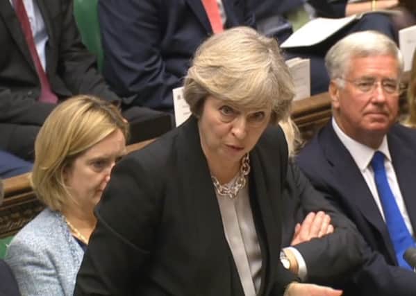 Prime Minister Theresa May speaks during Prime Minister's Questions today