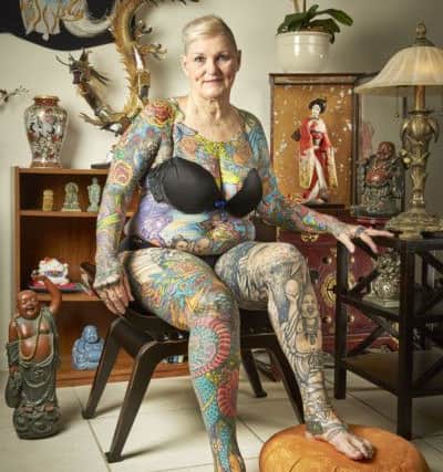 The female most tattooed senior citizen  as she appears in this year's Guinness World Records.