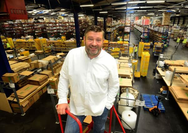Dan Cluderay the founder of Approved Food at the company's warehouse in Sheffield. Picture Scott Merrylees.