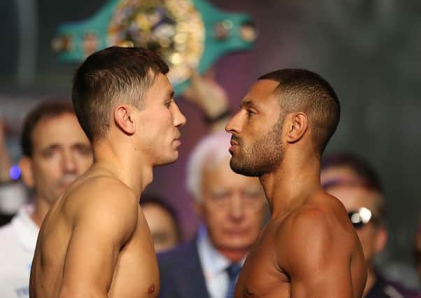 HEAD-TO_HEAD: Gennady Golovkin and Kell Brook during the weigh-in at The O2, London, yesterday. Picture: Steven Paston/PA