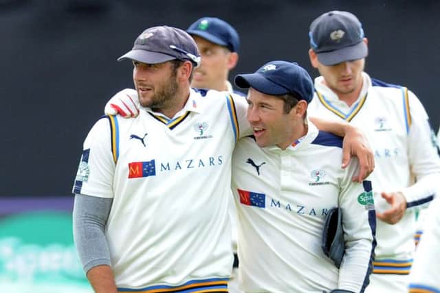 Tim Bresnan and Andrew Hogg celebrate Yorkshire's win  against Durham. Picture: Steve Riding.