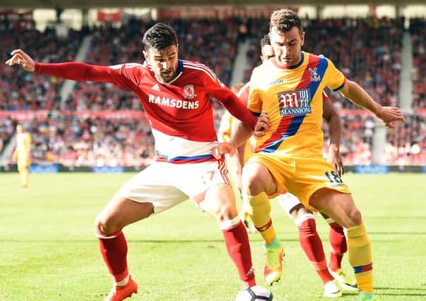 Middlesbrough defender Antonio Barragan (left) challenges Crystal Palace midfielder James McArthur.