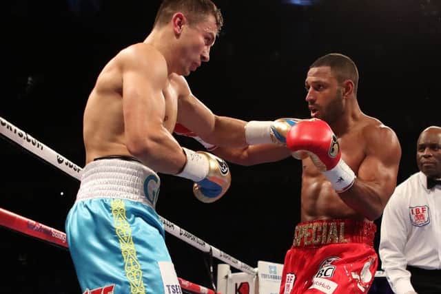 Kell Brook lands a right-handed blow during his WBC, IBF and IBO World Middleweight title bout against Gennady Golovkin at The O2 Arena. PRESS ASSOCIATION Photo. Picture: Nick Potts/PA.