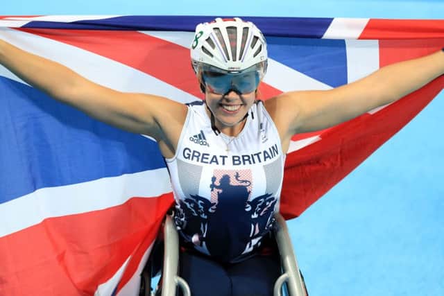 Great Britian's Hannah Cockroft celebrates winning gold in the Women's 100m T34 Final in Rio. Picture: Adam Davy/PA