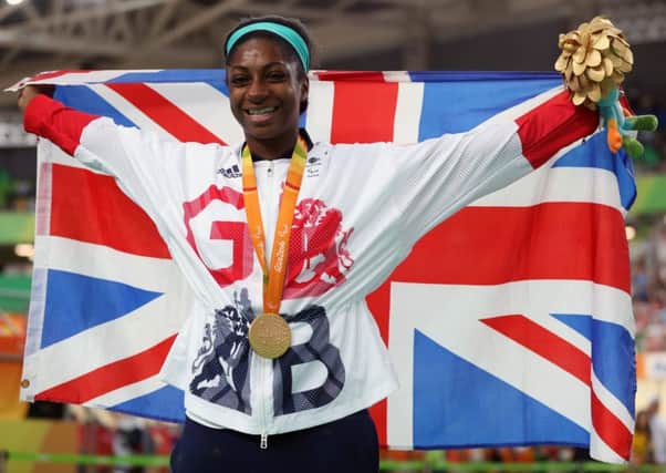 Great Britain's Kadeena Cox celebrates with her gold medal won in the Women's C4-5 500m Time Trial final in Rio. Picture: Andrew Matthews/PA