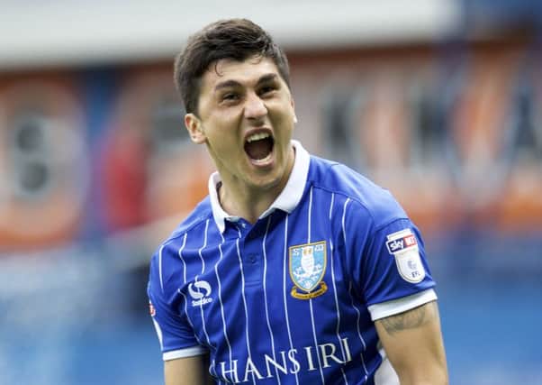 Fernando Forestieri is all smiles after netting Sheffield Wednesdays winner against Wigan (Picture: Steve Ellis).