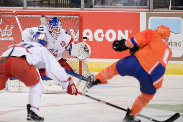 TREBLE TOP: Jesse Schultz, right, fires in his third goal and Steelers' fifth against Salzburg. Picture: Dean Woolley.