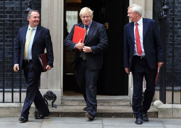 Brexiteers Liam Fox, Boris Johnson and David Davis leave last week's Cabinert, but can they agree on a Brexit strategy?