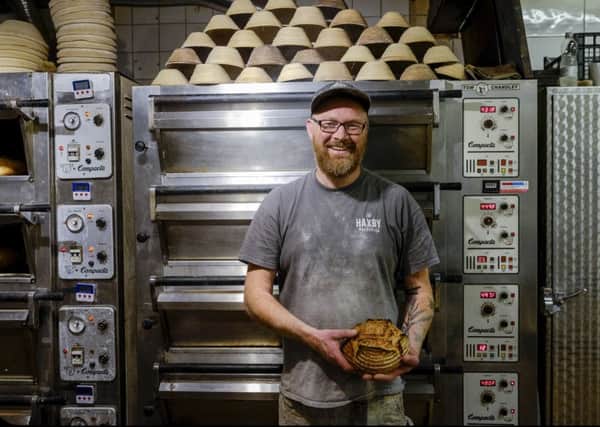 Phil Clayton with the Yorkshire Mill Sourdough after being turned out of the ovens. Picture: Tony Bartholomew
