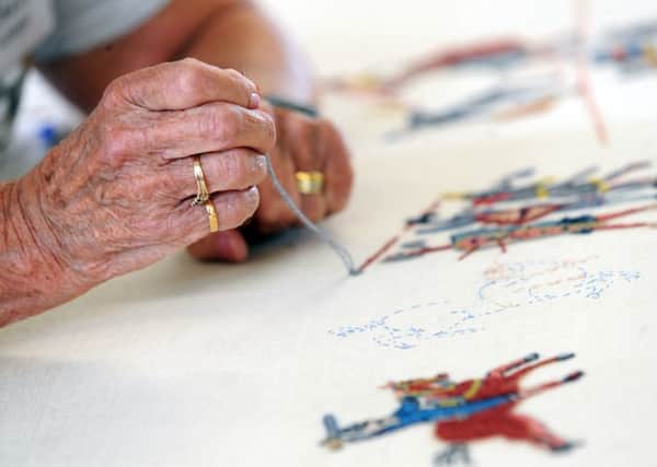 Embroiders work on the Battle of Stamford Bridge Tapestry, at the Community Centre, Stamford Bridge, York. Picture by Simon Hulme