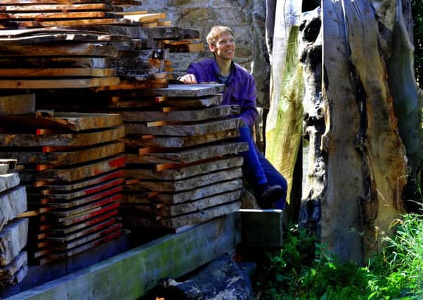 Mark Bennett at  Woodlark in Malton amongst wood 'drying in the stick' for years  including  burr maple, quilted willow, burr oak and silver birch