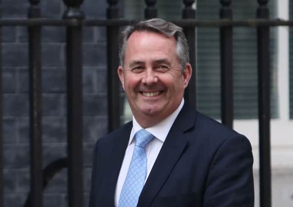 Dr Liam Fox, arrives at 10 Downing Street as new Prime Minister Theresa May begins a Cabinet reshuffle. Photo: Steve Parsons/PA Wire